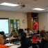 Junior Will Wise looks on as Jason Taylor teaches his AP chemistry students during first period.