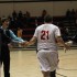 Senior Sam Meaders (21) takes to the court with cheers from teammates and a large Lovejoy home crowd.