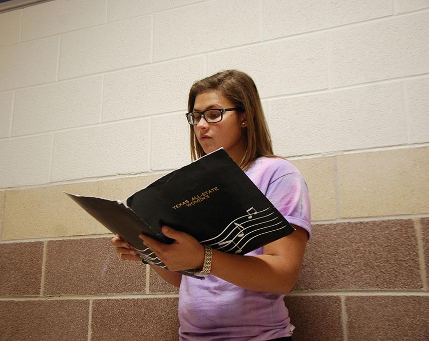 Freshman Kennedy Miller rehearses for the upcoming All-Region auditions.