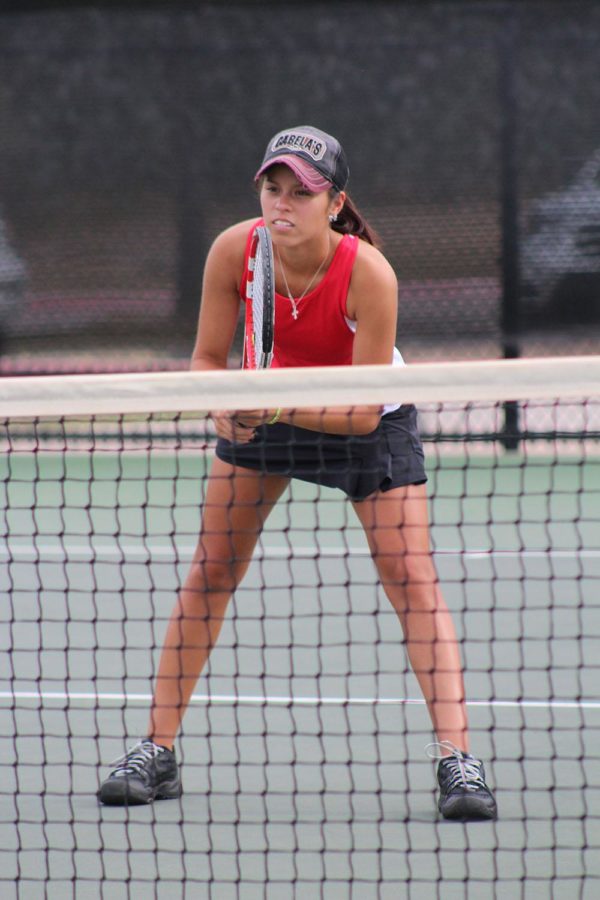 Junior Anna Dickens is the number one girl on the varsity tennis team.