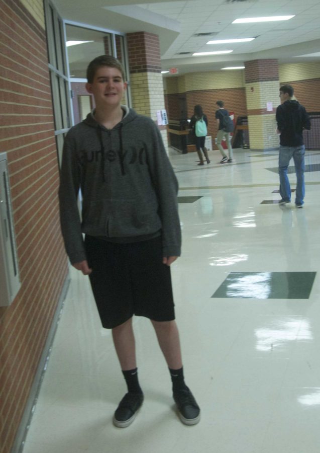 Freshman Ben Buhse leaves his legs subject to the elements by wearing shorts in the below-freezing weather.