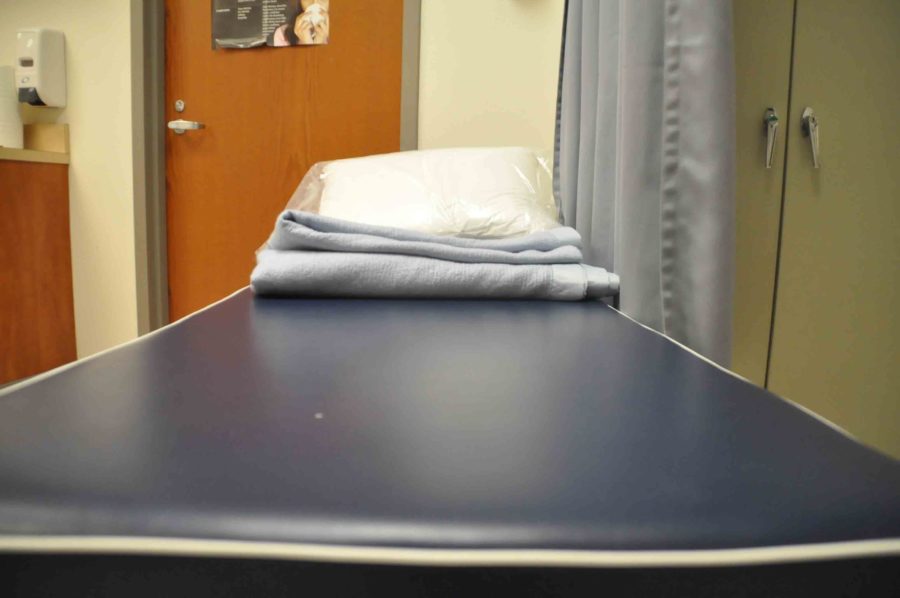 Despite the cots in the nurses office being empty in this picture, they are often filled by sick students.