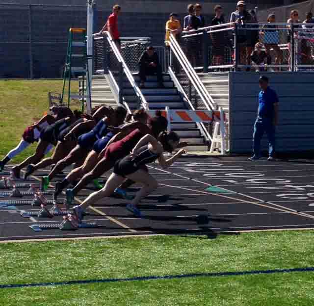 Sophomore Elizabeth Hana ran the 100-meter at the District Track meet April 9, 2014.
