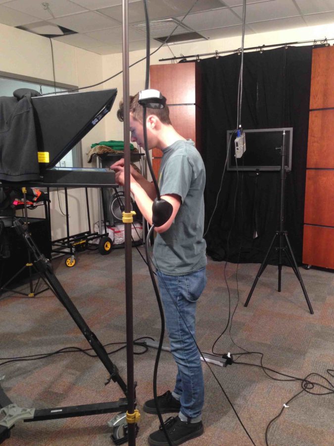 As executive producer of the Lovejoy News Network, senior Garrison Clough has many responsibilities including making sure the studio teleprompter is properly functioning. This summer he used his video and movie skills as an intern at Kamp Hollywood.