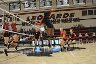 Maddi Toth successfully spikes the ball.