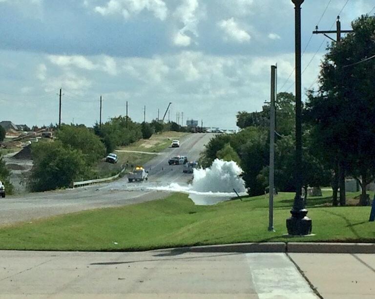 A water line burst spilled water across Stacy Road that caused major traffic delays Saturday morning.