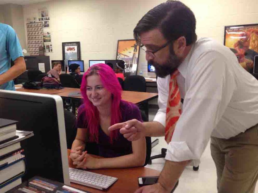 Teacher Jeff Seidel instructing Lydia Fennell in AP Studio Art 2D Design Photo. 