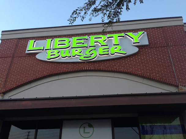 A new burger restaurant, Liberty Burger, meets expectations, but can be expensive. 