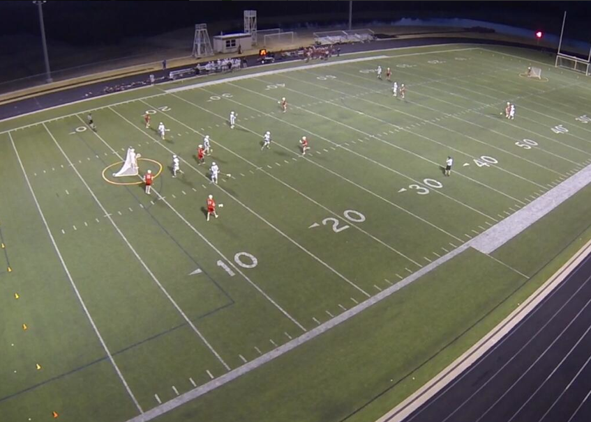 The boys lacrosse team playing against McKinney during the 13-14 season. 