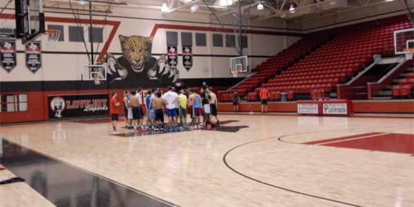 The basketball boys practice daily in the main gym, which payed off for them in their first tournament of the season. 