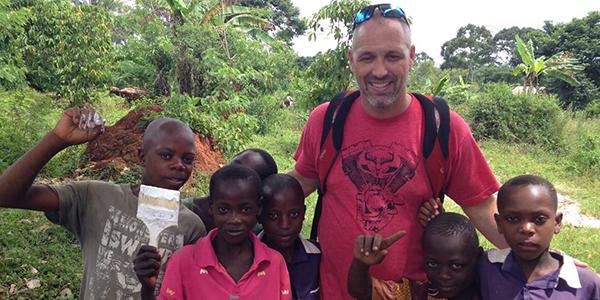 Principal Chris Mayfield traveled to Uganda this summer to volunteer with kids.