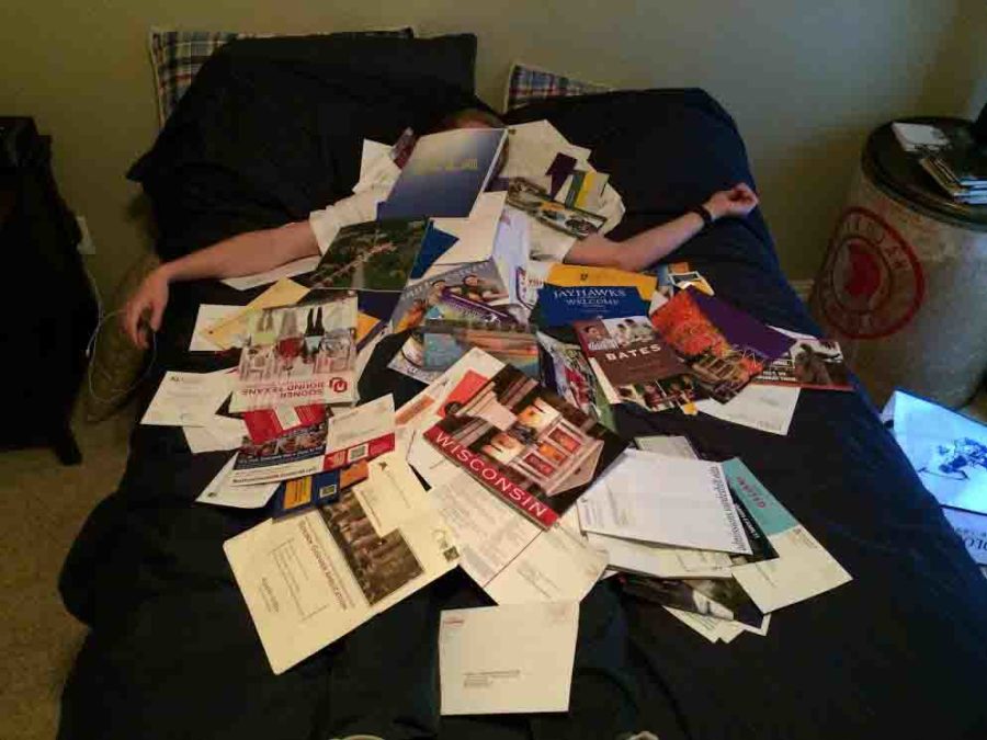 Matt Smith, a senior, feels as though he is weighed down by a current influx in college advertisements. 