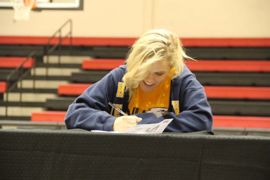 Senior volleyball player, Emmaline Stockton signs to Northwest University in Washington state.