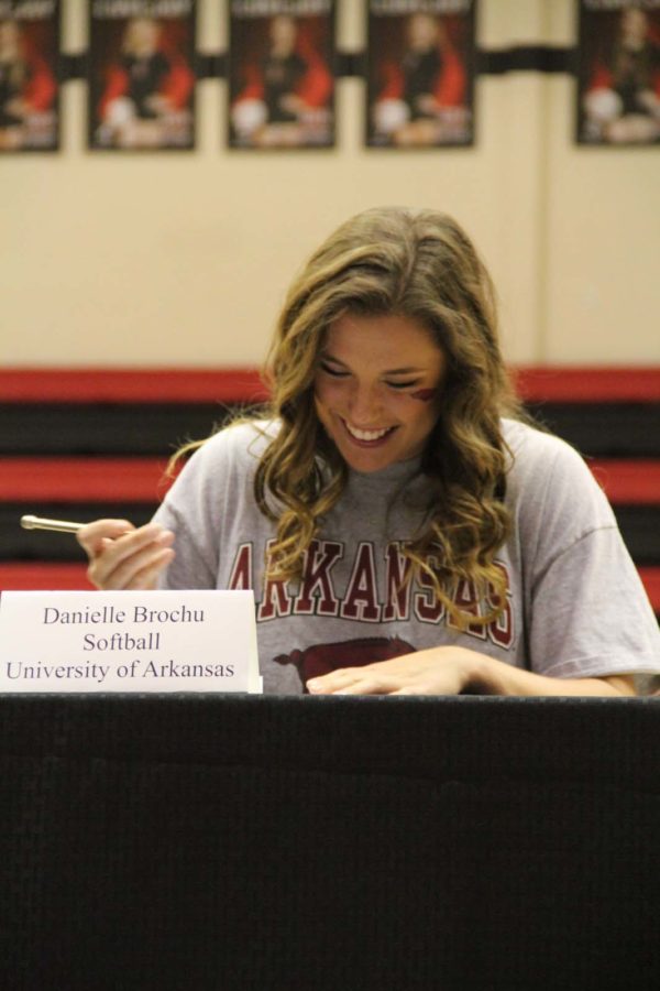Softball player Danielle Brochu signs to Arkansas on November 12, 2014.