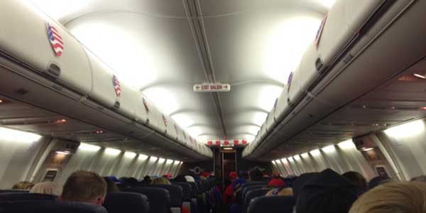 With stars and stripes hearts lining the overhead storage compartments on a flight from Washington, D.C. to Dallas, more than 40 veterans make their return home after a visit to war memorials in honor of Veterans Day.