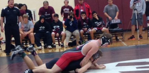 The Leopard wrestling team in action Wednesday night as they take on Rockwall in a dual meet.