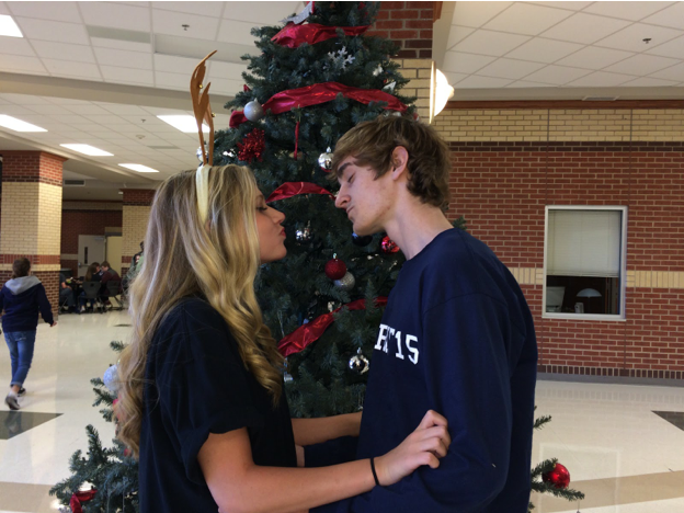 Seniors Greg Watson and Lizzy Riley are some of the many students that partake in kissing during the holiday season. 