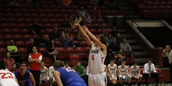 Senior Adam McDaniel, takes a free throw during the game against Trinity Christian.