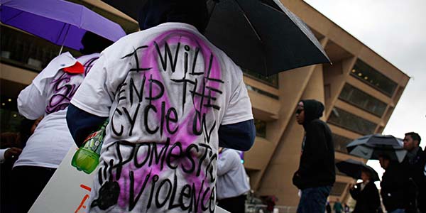 Joey Guareado, 11, and his family attend the Men Against Abuse Rally spotlighting domestic violence in Dallas, Texas, in March 2013.