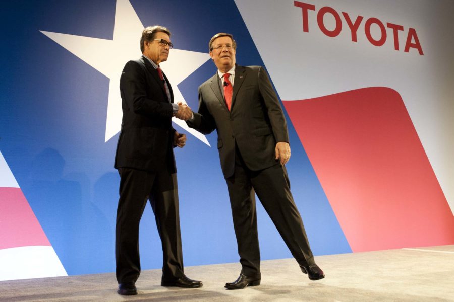 Texas Governor Rick Perry (left to right) and Toyota North America CEO Jim Lentz shake hands during the Toyota Hello Texas event on Oct. 27, 2014 in Plano, Texas. 
