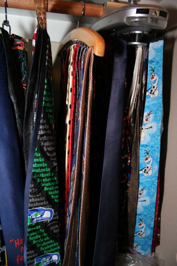 With a collection of ties hanging in his closet, English teacher Jasen Eairheart wears a different tie nearly every school day.