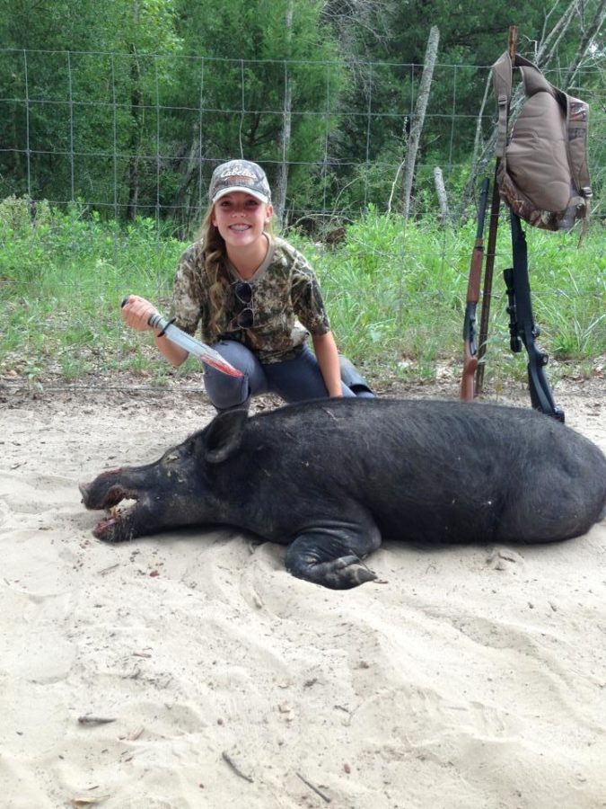 Sophomore Ellie Smith hunts ferral hogs in Avery, Texas.