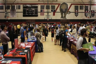 The final college fair of the school year is being held in the main gym with over 50 college representatives attending. 