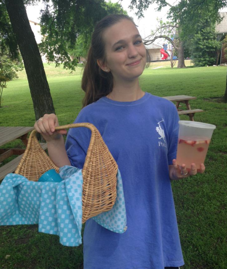 Jillian Sanders sporting homemade strawberry lemonade on a picnic Saturday.