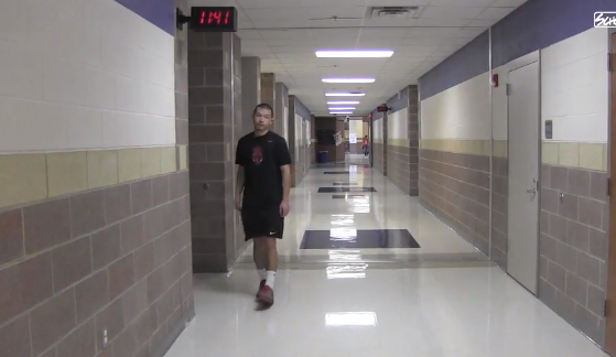 Senior Chris Prudhomme rolls down the hall with his Heely shoes like many seniors. 