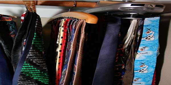 With a collection of ties hanging in his closet, English teacher Jasen Eairheart wears a different tie nearly every school day.