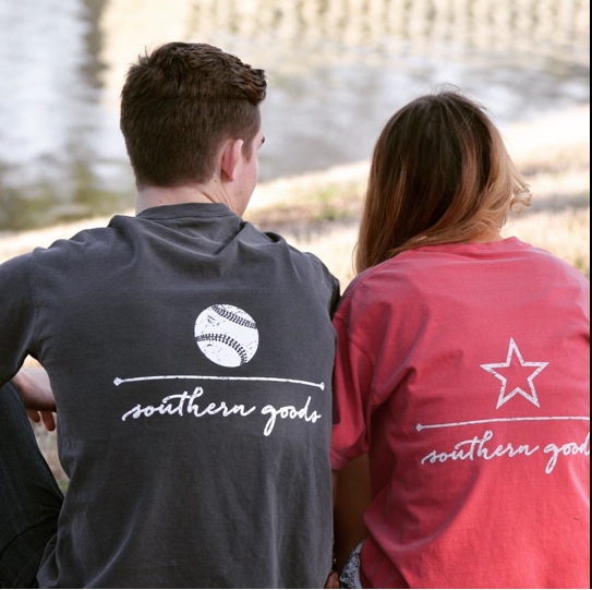 Senior Adam McDaniel and Lucas Christian Academy student AnnMarie Barfield pose in Southern Good t shirts. 