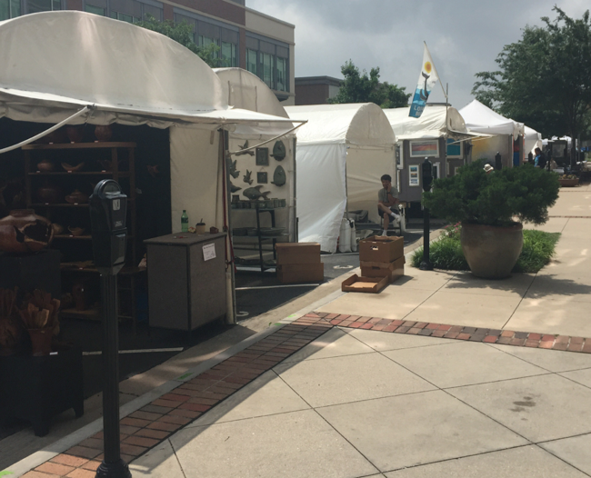 Artists from throughout the area have their tents set up at Watters Creek for the Allen Arts Festival.