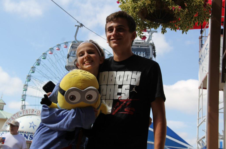 Flavio posses with Mary Catherine Wells at the Red Ledgers annual trip to the Texas State Fair.