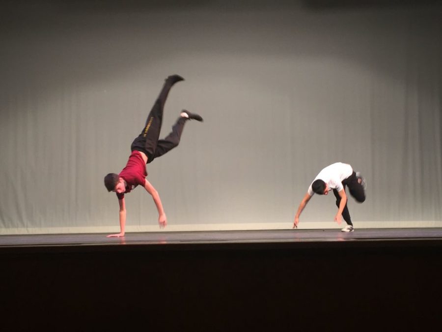 Members of studio dance practice the routine they will perform at tonights event.