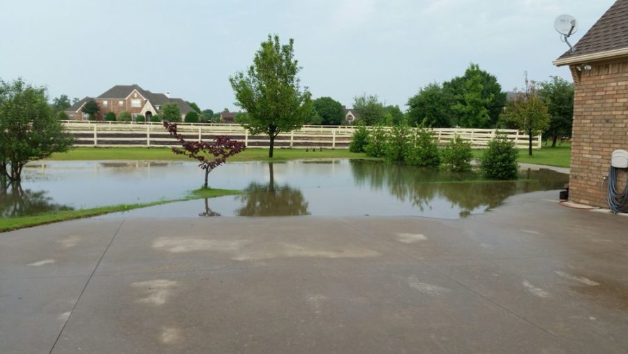 The weekends rain left pools of water several inches deep on properties around Lucas.