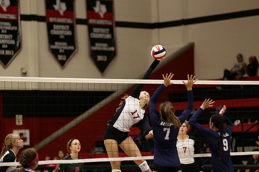 Sophomore Rachel Langs spikes the ball against Wylie East on Tuesday, Sept. 22. 