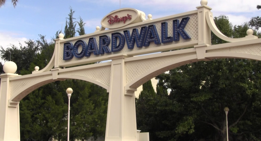 Signs direct people how to walk to Disneys Boardwalk.  The Disney Parks have recreated nearly every major landmark.
