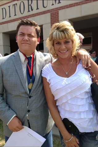 Michelle Motsenbocker with son, Michael, in the courtyard at Lovejoy High School. 