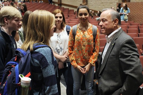Students visit with the Texas Secretary of State after the first of two speeches in the auditorium on Tuesday.