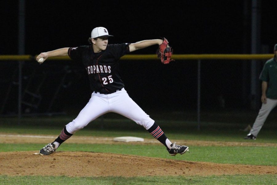 Senior Clayton Bilke pitches in the fourth inning against Prosper on March 22.