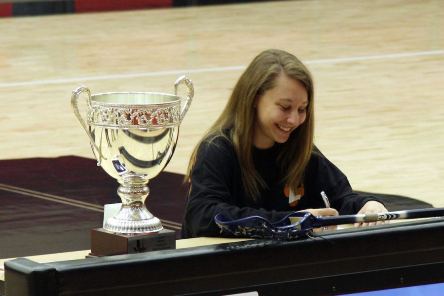 Senior Lauren Helsley, who plays for McKinney lacrosse, signed to play at Lourdes University.