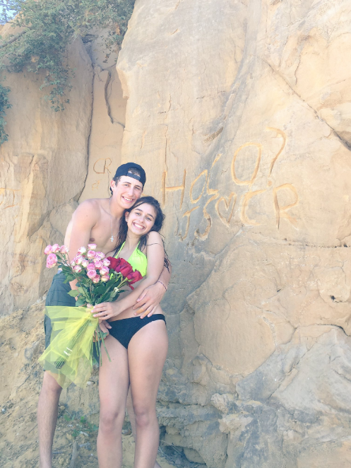 Seniors Chase Roberts and Julia Spooner hope to leave a mark on homecoming like they did on the rock that Chase used to ask Julia.
