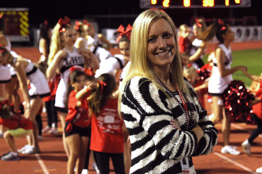 New cheer coach Shelly Wiggins has been coaching the sport for 20 years now. Wiggins moved to the district after previously working as a competitive cheer coach at a local gym.