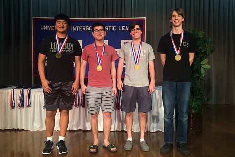 Last years Computer science team smiles with their broze state medals. 