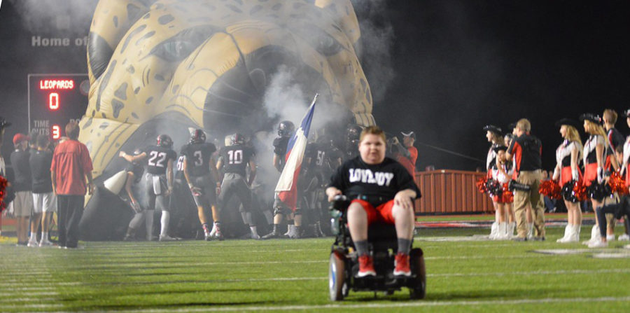 As the football team take the field on Friday nights, they have a special teammate in mind.
