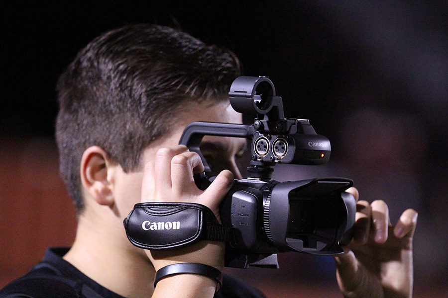 Junior Michael Ray has a unique view of the gridiron: through the lens of a video camera.