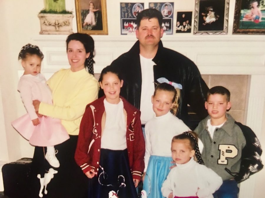 The entire Ray family dressed up for Lovejoy Elementarys 50s Sock Hop Family Night in 2002.
