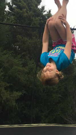 Mallory jumping on her trampoline for the first time since her diagnosis.