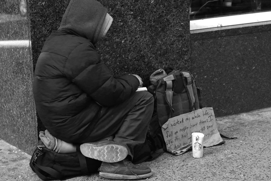 A+homeless+man+in+Times+Square+in+New+York+braces+the+cold+for+donations+and+spare+change.+Columnist+Lily+Hager+writes+about+the+importance+of+helping+the+disadvantaged+and+unfortunate.