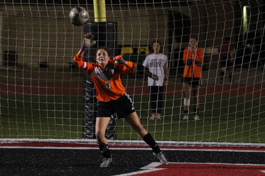 Senior Carolyn Murad, Goalie, defends the goal.